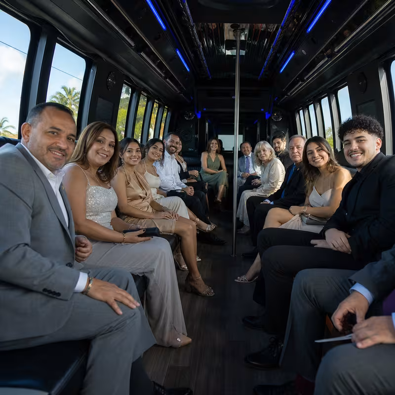 Wedding guests seated inside a Hialeah party bus