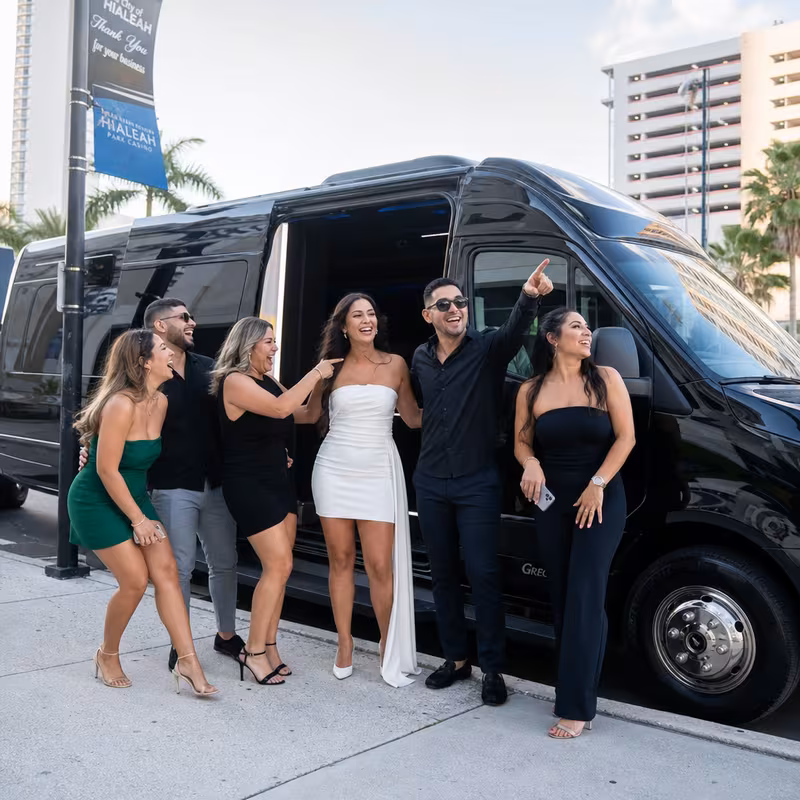 Group boarding a white charter bus for Bachelor & Bachelorette Transportation transportation in Hialeah