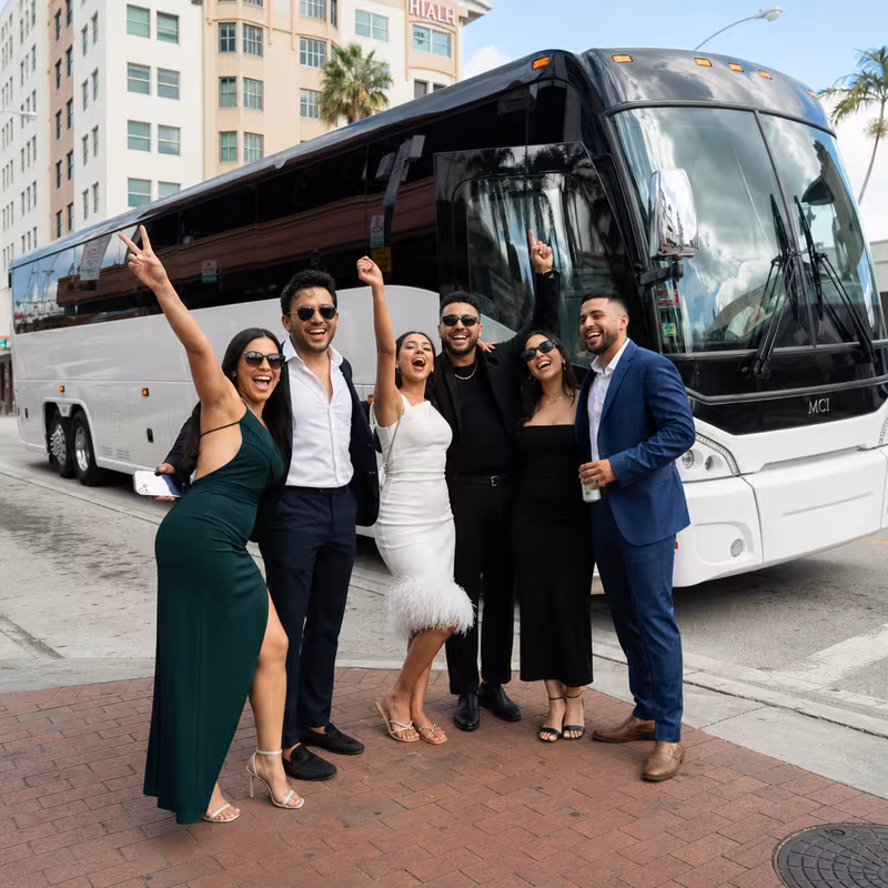 Passengers loading luggage while boarding an Hialeah group shuttle