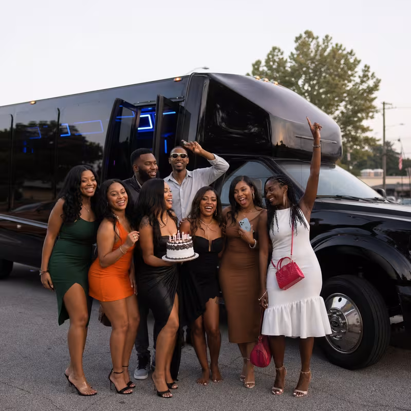 Group boarding a white charter bus for Birthday Transportation transportation in Hialeah