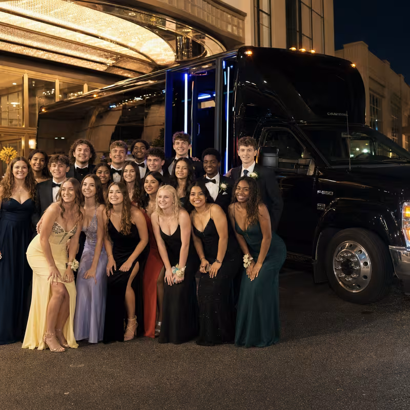 Party bus interior with wraparound leather seating and LED lighting in Hialeah