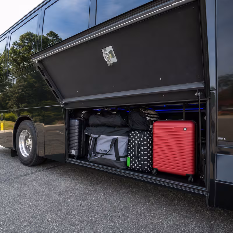 Party bus interior with wraparound leather seating and LED lighting in Hialeah