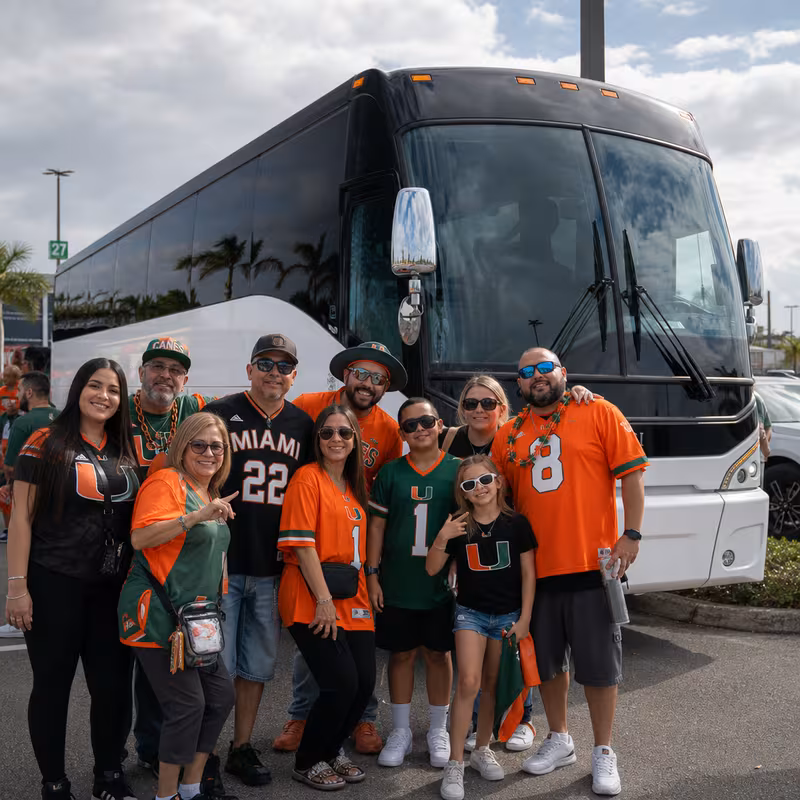 Passengers loading luggage while boarding an Hialeah group shuttle